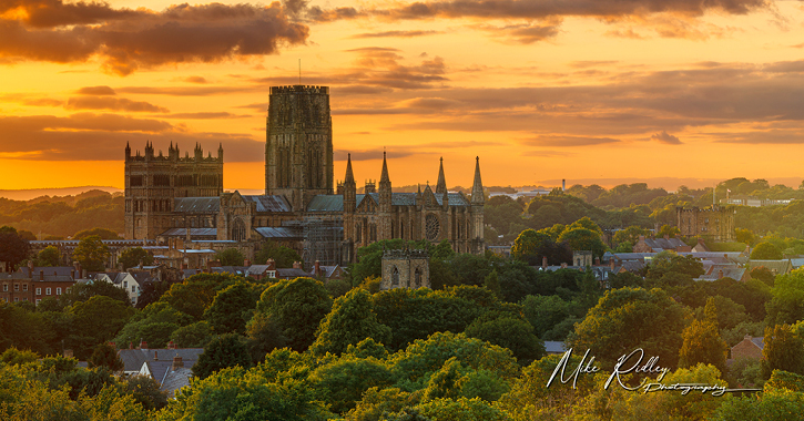 Durham Cathedral and Castle while sunsets - red and orange sky by Mike Ridely